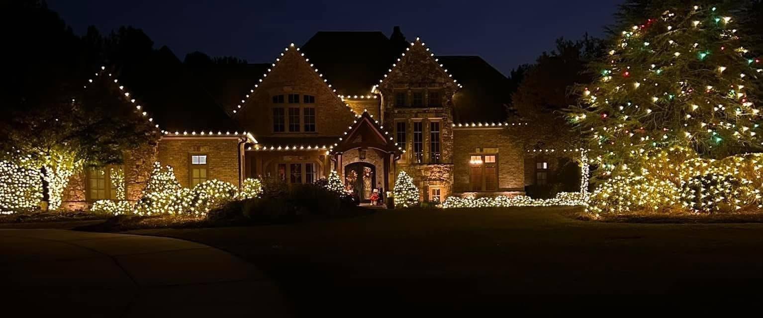 Wide estate frontage, one continuous line — Christmas light installation by Mike’s Cincinnati Christmas Lights