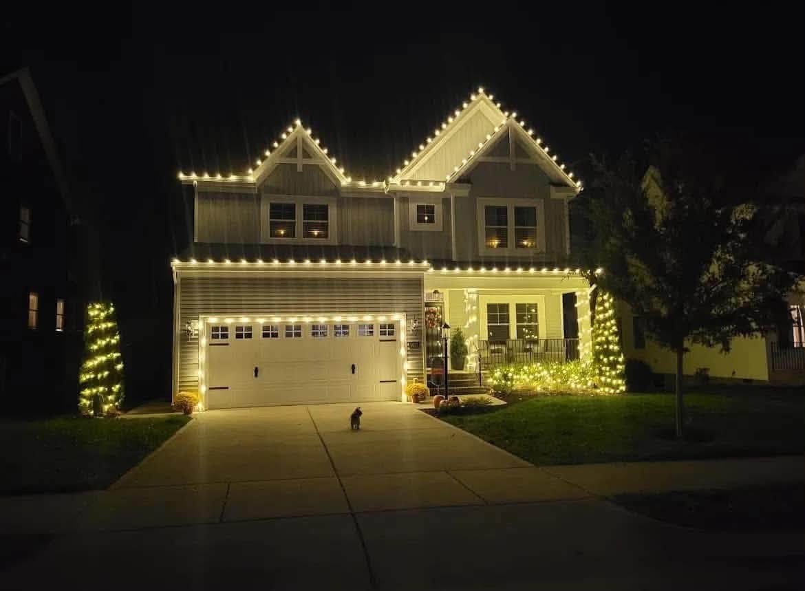 Warm white over the garage bays &mdash; Christmas light installation by Mike&rsquo;s Cincinnati Christmas Lights